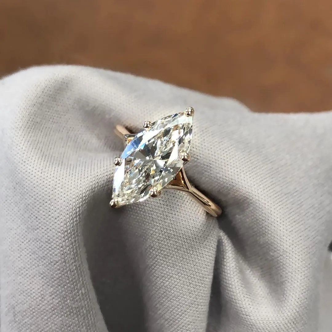 /public/photos/live/Sparkle Marquise Cut Moissanite Dainty Split Shank Ring 651 (4).webp